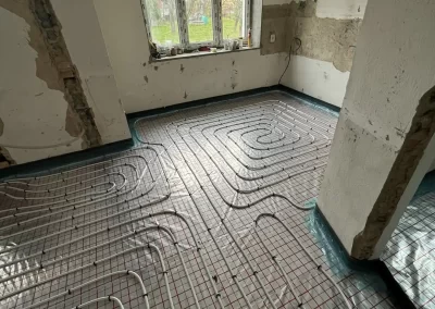 Instalace podlahového topení a rekonstrukce rodinného domu. Jistebník