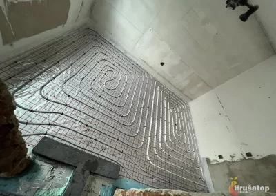 Instalace podlahového topení a rekonstrukce rodinného domu. Jistebník